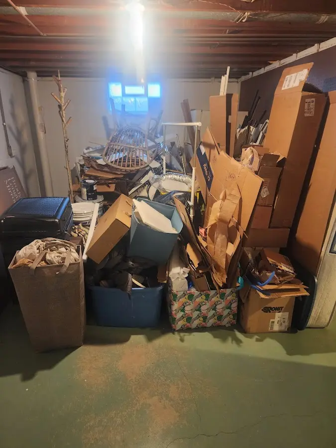 Roll-off dumpster container at job site for 4 Yard Dumpster Rental in Helena Valley Southeast